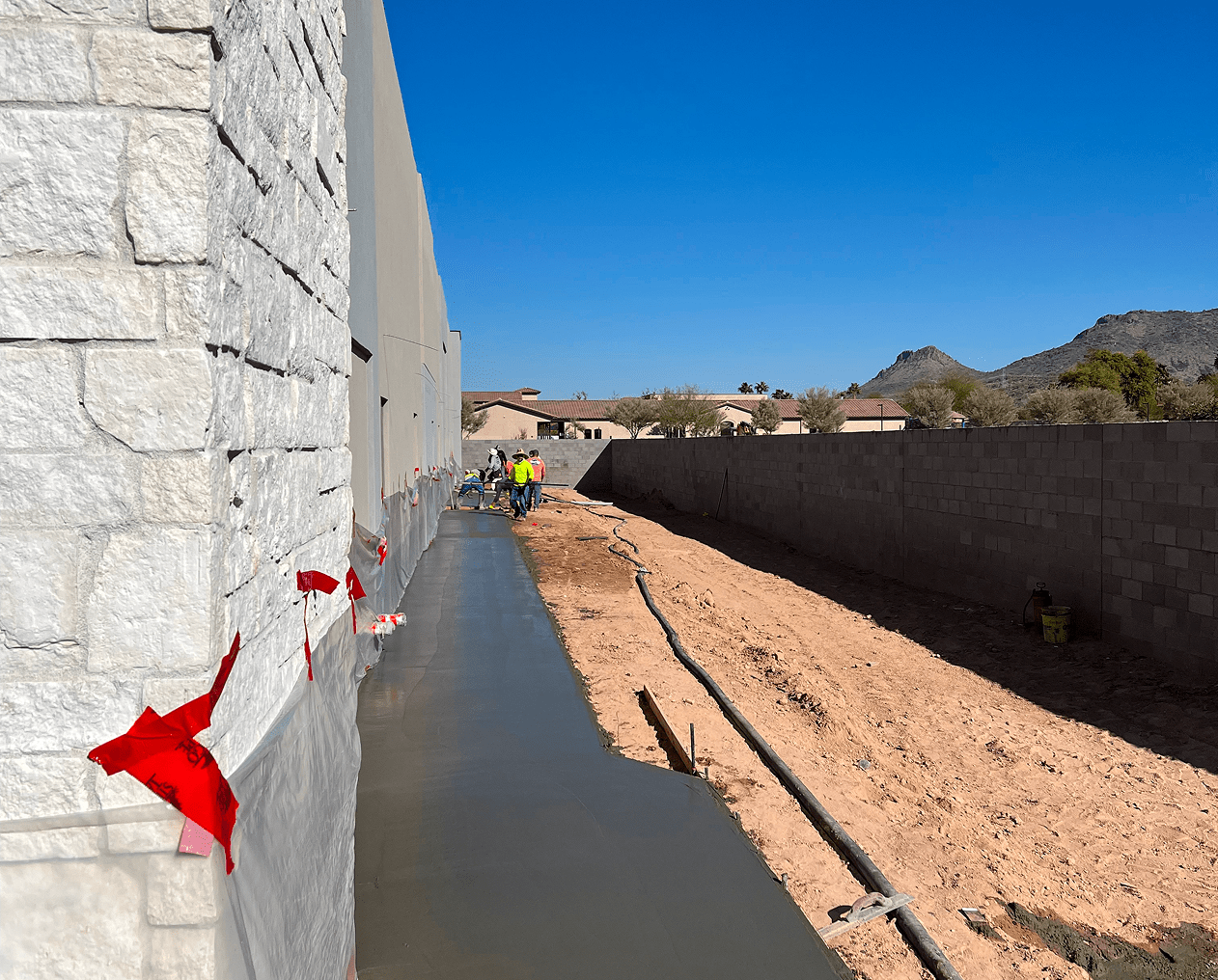 Construction site with fresh concrete path