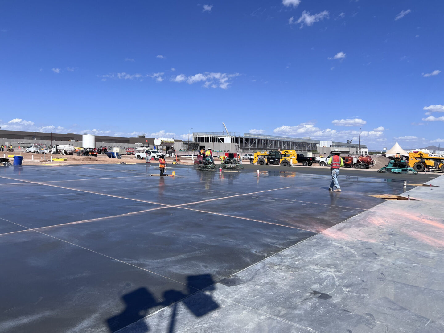 Construction site with workers and machinery